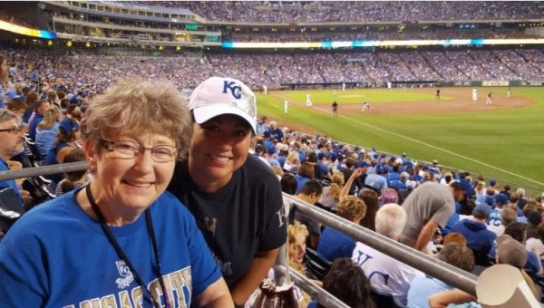 On Sept. 24, Jen Moss (right) took Jody Wooton to Kauffman Stadium, where they cheered as the Royals beat the Seattle Mariners 10-4 to clinch the American League Central Division on their way to winning the World Series. Both kept a copy of this photo.
