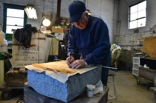 Vice president Arthur DeFilippo prepared a headstone at Woodlawn Memorials in Everett, a family-run business where sales have been declining for a decade.