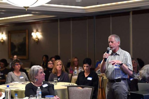 Henry Fersko-Weiss, co-founder and president of the International End of Life Doula Association, conducts a session at the association’s training at the Omni Hotel in San Francisco.