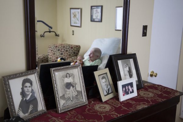 Finster began hospice care at the beginning of the summer. Pictures of her and her husband as a young woman are the last reminders in her room of her life before dementia.