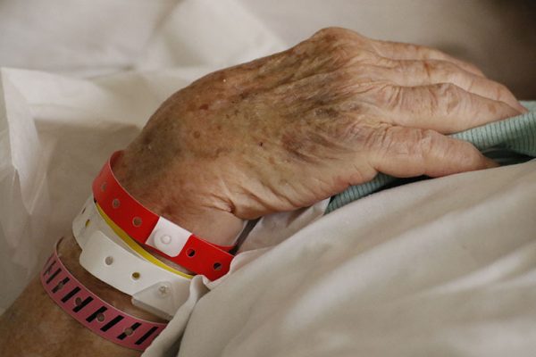 Hands of an older woman in the hospital