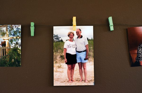 A photograph of Shelley Duffin's mother and father hangs in her home. Shelley and her Father reflect on her mother's passing through assisted suicide which occured in Switzerland due to narrowly being denied the right in Canada.